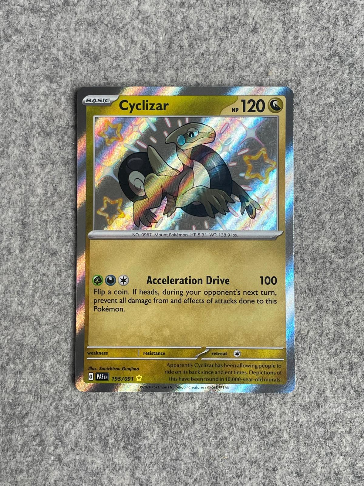 Cyclizar PAF 195/091 är ett Pokémon-kort från setet Paldean Fates.