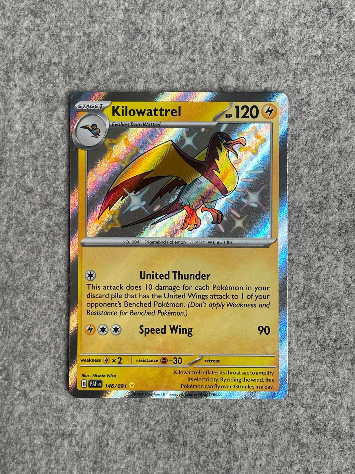 Kilowattrel PAF 146/091 är ett Pokémon-kort från setet Paldean Fates.