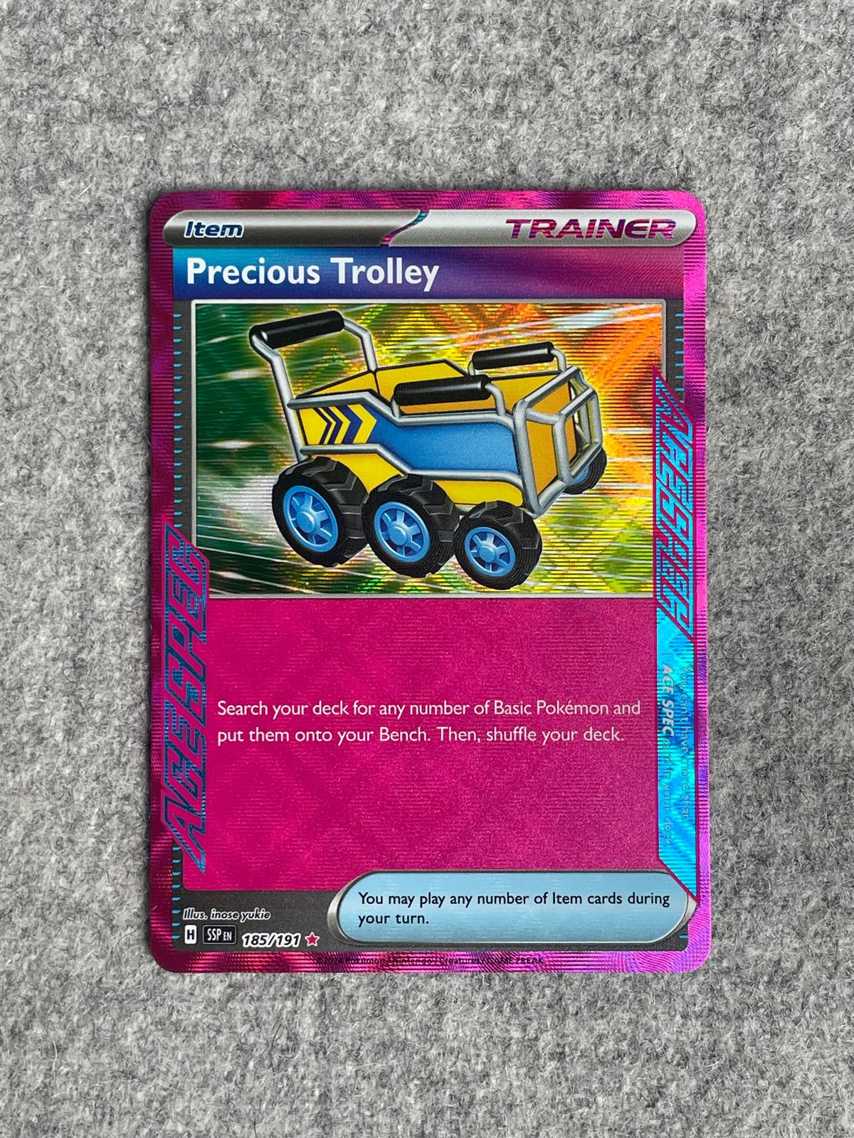 Precious Trolley SSP 185/191 är ett Pokémon-kort från setet Surging Sparks.